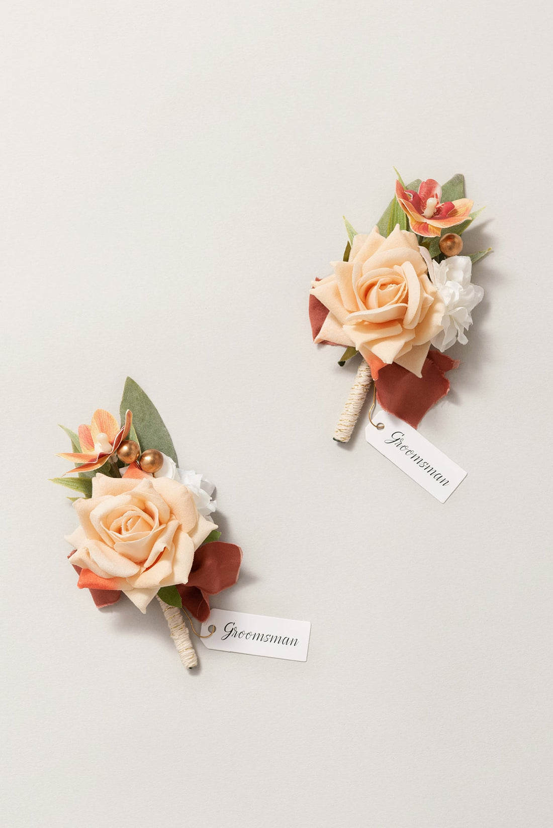 Boutonnieres in Sunset Terracotta