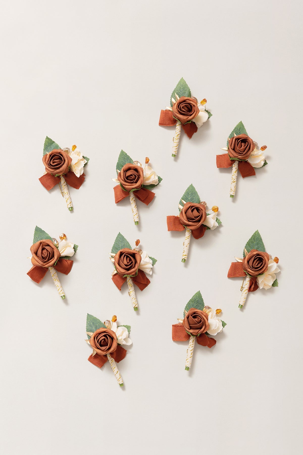 Boutonnieres for Guests in Burnt Orange