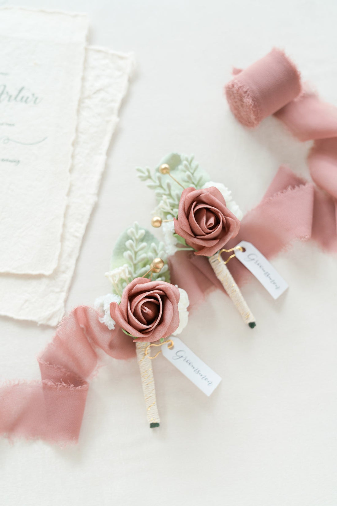 Boutonnieres in Dusty Rose & Cream